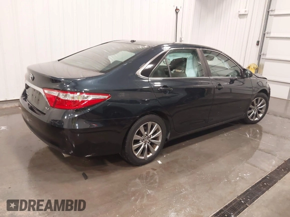 2015 Toyota Camry XLE with VIN 4T1BF1FK7FU906861, listed as a IAAI auction lot 41753920 with 92,389 mi miles and . Bid and sale history available at DreamBid. Image 4.