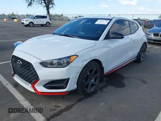 2019 Hyundai Veloster N with VIN KMHT36AH6KU001916, listed as a IAAI auction lot 41577775 with 77,471 mi miles. Bid and sale history available at carsss.com. Image 2.
