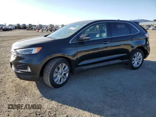 2022 Ford Edge Titanium z VIN 2FMPK4K98NBA38797, wystawiony jako Copart lot #42973135 z przebiegiem 69 790 mil mil oraz Szkoda całkowita • Salvage title. Historia ofert i sprzedaży dostępna na DreamBid. Obrazek 1.