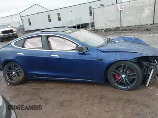 2016 Tesla Model S 90D with VIN 5YJSA1E44GF169960, listed as a IAAI auction lot 41523807 with 124,738 mi miles and . Bid and sale history available at DreamBid. Image 13.