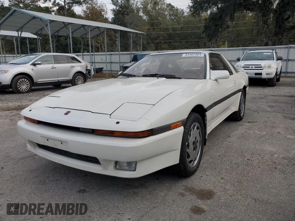1988 Toyota Supra с VIN JT2MA71J0J0088041, выставлен на аукционе Copart как лот 84402804 с пробегом 195 921 миль миль и Чистый • Clean title. История ставок и продаж доступна на DreamBid. Изображение 1.