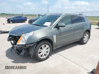 2013 Cadillac SRX Luxury Collection z VIN 3GYFNCE39DS542125, wystawiony jako IAAI lot #42067672 z przebiegiem 158 013 mil mil oraz . Historia ofert i sprzedaży dostępna na DreamBid. Obrazek 2.