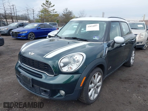 2011 MINI Countryman S with VIN WMWZC5C54BWL54135, listed as a IAAI auction lot 42034897 with 130,082 mi miles and . Bid and sale history available at DreamBid. Image 6.