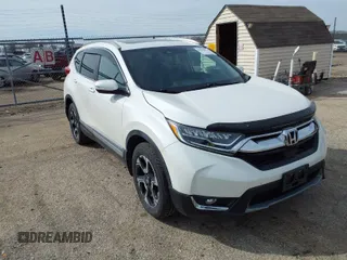 2017 Honda CR-V Touring with VIN 5J6RW2H95HL044505, listed as a IAAI auction lot 41856975 with 117,826 mi miles. Bid and sale history available at carsss.com. Image 1.