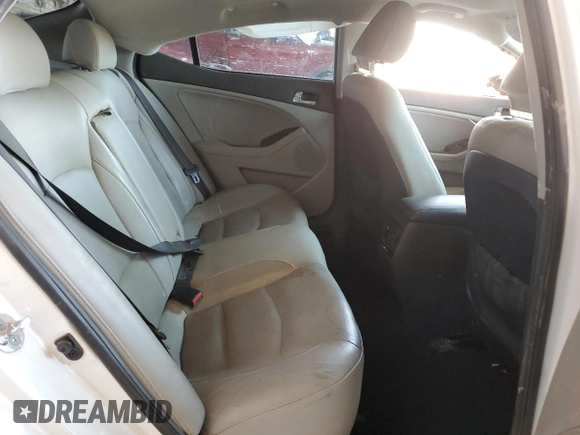2014 Kia Optima EX z VIN 5XXGN4A71EG275210, wystawiony jako Copart lot #58095515 z przebiegiem 113 030 mil mil oraz Szkoda całkowita • Salvage title. Historia ofert i sprzedaży dostępna na DreamBid. Obrazek 10.