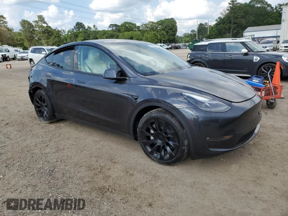 2024 Tesla Model Y Long Range z VIN 7SAYGAEE7RF123224, wystawiony jako Copart lot #58410545 z przebiegiem Nie podano mil oraz Szkoda całkowita • Salvage title. Historia ofert i sprzedaży dostępna na DreamBid. Obrazek 4.