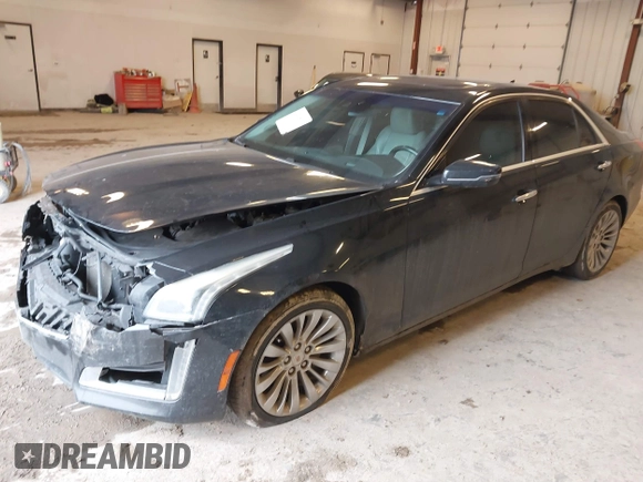 2014 Cadillac CTS Luxury AWD with VIN 1G6AX5SX2E0195357, listed as a IAAI auction lot 41677831 with 152,567 mi miles and . Bid and sale history available at DreamBid. Image 17.