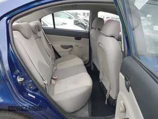 2009 Hyundai Accent Auto GLS with VIN KMHCN46C69U313921, listed as a IAAI auction lot 42011166 with 123,026 mi miles. Bid and sale history available at carsss.com. Image 8.