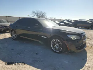 2014 BMW 7 Series ALPINA B7 with VIN WBAYE8C50ED135020, listed as a Copart auction lot 41972515 with 154,733 mi miles and Salvage Title. Bid and sale history available at carsss.com. Image 4.