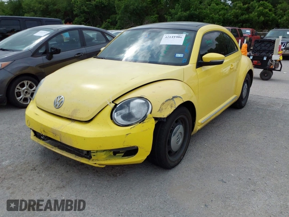 2013 Volkswagen Beetle 2.5L w/Sun/Sound/Nav with VIN 3VWJX7AT2DM680808, listed as a IAAI auction lot 42141906 with 113,399 mi miles and . Bid and sale history available at DreamBid. Image 2.