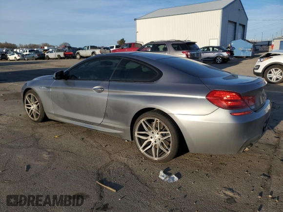 2015 BMW 6 Series 650i with VIN WBAYM9C53FD248356, listed as a Copart auction lot 85499554 with 115,292 mi miles and Salvage Title. Bid and sale history available at DreamBid. Image 2.