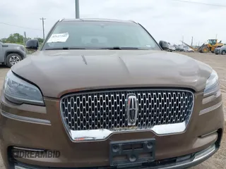 2022 Lincoln Aviator Reserve z VIN 5LM5J7WC7NGL17505, wystawiony jako IAAI lot #42127205 z przebiegiem 35 018 mil mil oraz . Historia ofert i sprzedaży dostępna na DreamBid. Obrazek 6.