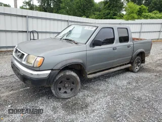 2000 Nissan Frontier XE z VIN 1N6ED27T2YC311037, wystawiony jako Copart lot #57901285 z przebiegiem Nie podano mil oraz Szkoda całkowita • Salvage title. Historia ofert i sprzedaży dostępna na DreamBid. Obrazek 1.