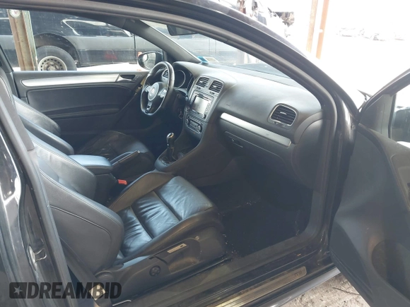 2012 Volkswagen Golf w/Sunroof & Navi z VIN WVWRF7AJ1CW285279, wystawiony jako IAAI lot #41884105 z przebiegiem 145 851 mil mil oraz . Historia ofert i sprzedaży dostępna na DreamBid. Obrazek 5.