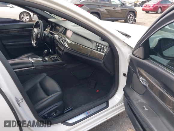 2015 BMW 7 Series 750Li with VIN WBAYE8C54FD780951, listed as a IAAI auction lot 41813038 with 103,131 mi miles. Bid and sale history available at carsss.com. Image 5.