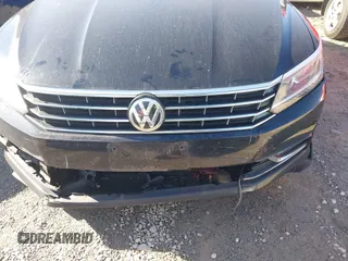 2016 Volkswagen Passat SE with VIN 1VWBT7A30GC049027, listed as a IAAI auction lot 41878460 with 125,261 mi miles and . Bid and sale history available at DreamBid. Image 6.