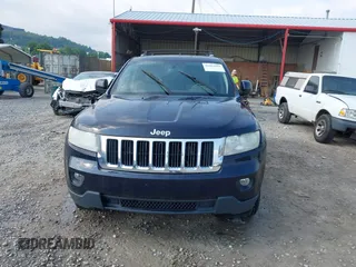 2011 Jeep Grand Cherokee Laredo with VIN 1J4RR4GG5BC622628, listed as a IAAI auction lot 42402893 with 163,731 mi miles and . Bid and sale history available at DreamBid. Image 13.