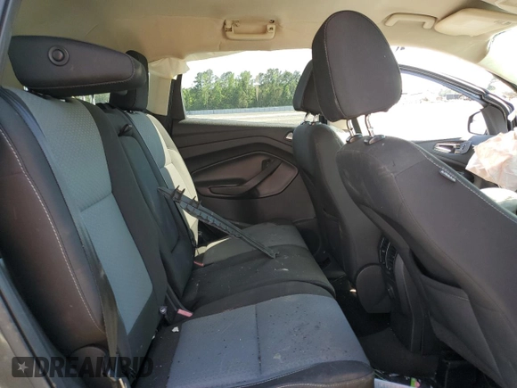 2017 Ford Escape SE z VIN 1FMCU0GD2HUA57505, wystawiony jako Copart lot #54814185 z przebiegiem 121 540 mil mil oraz Szkoda całkowita • Salvage title. Historia ofert i sprzedaży dostępna na DreamBid. Obrazek 11.