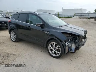 2015 Ford Escape Titanium z VIN 1FMCU9J99FUA90281, wystawiony jako Copart lot #59972565 z przebiegiem 125 351 mil mil oraz Czysty tytuł • Clean title. Historia ofert i sprzedaży dostępna na DreamBid. Obrazek 4.