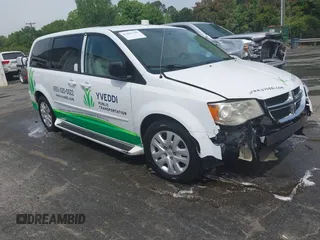 2014 Dodge Grand Caravan American Value with VIN 2C4RDGBG6ER380568, listed as a IAAI auction lot 41683180 with 303,612 mi miles and . Bid and sale history available at DreamBid. Image 1.