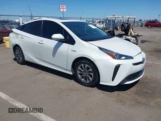 2019 Toyota Prius L Eco z VIN JTDKARFU5K3089070, wystawiony jako IAAI lot #42302536 z przebiegiem 122 911 mil mil oraz . Historia ofert i sprzedaży dostępna na DreamBid. Obrazek 1.