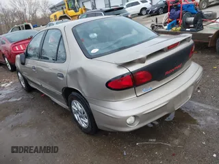2002 Pontiac Sunfire SE z VIN 1G2JB524927104822, wystawiony jako IAAI lot #41642973 z przebiegiem 120 321 mil mil oraz . Historia ofert i sprzedaży dostępna na DreamBid. Obrazek 3.