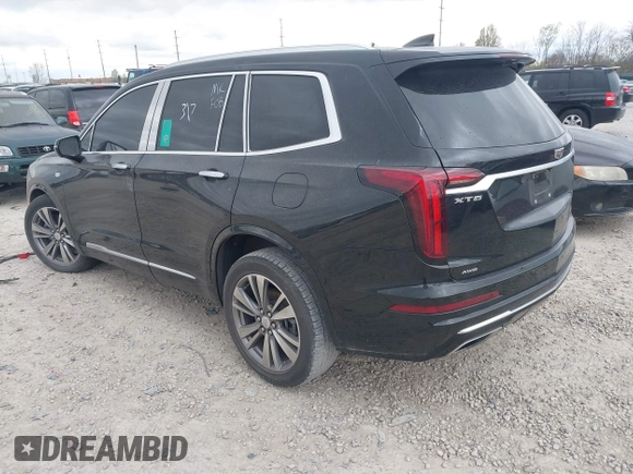 2021 Cadillac XT6 Premium Luxury with VIN 1GYKPDRS2MZ141406, listed as a IAAI auction lot 42014495 with 62,929 mi miles and . Bid and sale history available at DreamBid. Image 3.