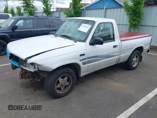 1995 Mazda B-Series Truck z VIN 4F4CR12A9STM30259, wystawiony jako IAAI lot #42243443 z przebiegiem 211 203 mil mil oraz . Historia ofert i sprzedaży dostępna na DreamBid. Obrazek 2.