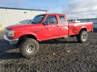 1996 Ford F-150 with VIN 1FTEX14N7TKA17710, listed as a Copart auction lot 76341824 with 215,390 mi miles and Salvage Title. Bid and sale history available at carsss.com. Image 1.
