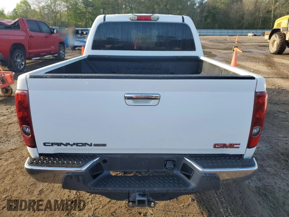 2012 GMC Canyon SLE1 with VIN 1GTD5MFE0C8108671, listed as a Copart auction lot 49618425 with 124,461 mi miles and Salvage Title. Bid and sale history available at carsss.com. Image 6.