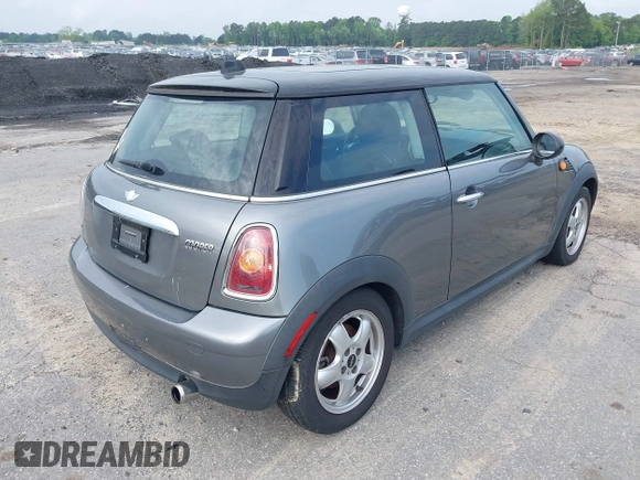 2010 MINI Hardtop with VIN WMWMF3C54ATZ21451, listed as a IAAI auction lot 42111383 with 164,116 mi miles and . Bid and sale history available at DreamBid. Image 4.