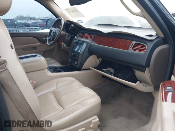 2014 GMC Yukon SLT with VIN 1GKS1CE02ER207447, listed as a IAAI auction lot 41604134 with 199,417 mi miles. Bid and sale history available at carsss.com. Image 5.