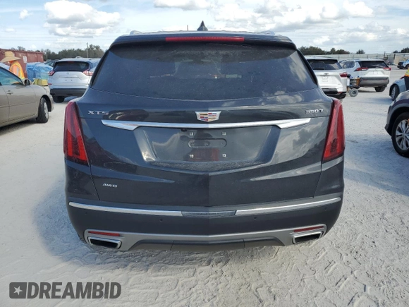 2023 Cadillac XT5 AWD Premium Luxury with VIN 1GYKNDR4XPZ153623, listed as a Copart auction lot 77071324 with 26,292 mi miles and Non Repairable. Bid and sale history available at DreamBid. Image 6.
