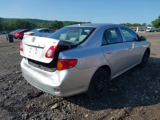 2010 Toyota Corolla with VIN 1NXBU4EE8AZ298585, listed as a IAAI auction lot 42554218 with 199,964 mi miles and . Bid and sale history available at DreamBid. Image 4.