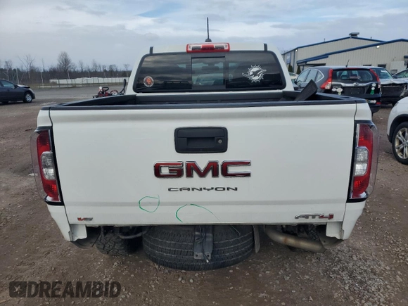 2021 GMC Canyon 4WD AT4 w/Leather with VIN 1GTG6FEN0M1100300, listed as a Copart auction lot 82281314 with 60,086 mi miles and Non Repairable. Bid and sale history available at carsss.com. Image 6.