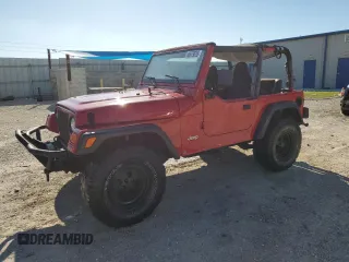 1999 Jeep Wrangler SE with VIN 1J4FY29P8XP483909, listed as a Copart auction lot 48679555 with 168,708 mi miles and Salvage title. Bid and sale history available at DreamBid. Image 1.