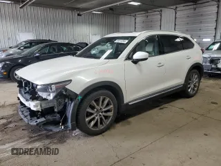 2017 Mazda CX-9 Grand Touring z VIN JM3TCBDY6H0142436, wystawiony jako Copart lot #59614265 z przebiegiem 76 833 mil mil oraz Czysty tytuł • Clean title. Historia ofert i sprzedaży dostępna na DreamBid. Obrazek 1.
