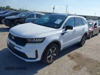 2021 Kia Sorento S with VIN 5XYRL4LC1MG002786, listed as a IAAI auction lot 42253503 with 90,893 mi miles and . Bid and sale history available at DreamBid. Image 2.
