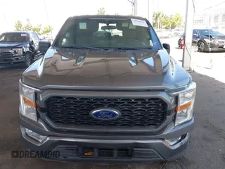 2021 Ford F-150 XL with VIN 1FTEX1CP5MFA52842, listed as a IAAI auction lot 42520858 with 107,873 mi miles and . Bid and sale history available at DreamBid. Image 12.