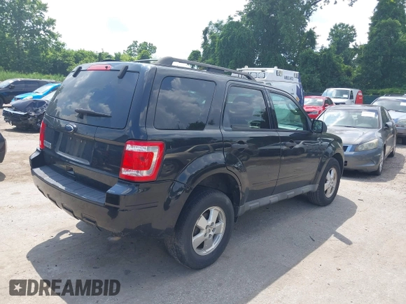 2011 Ford Escape XLT z VIN 1FMCU9D71BKA12061, wystawiony jako IAAI lot #42635447 z przebiegiem 195 433 mil mil oraz . Historia ofert i sprzedaży dostępna na DreamBid. Obrazek 4.