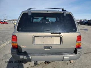 1997 Jeep Grand Cherokee Limited with VIN 1J4GZ78Y4VC754624, listed as a Copart auction lot 49884435 with 144,682 mi miles and Salvage Title. Bid and sale history available at carsss.com. Image 6.