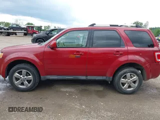 2010 Ford Escape Limited z VIN 1FMCU0EG5AKC21828, wystawiony jako IAAI lot #42343582 z przebiegiem 135 534 mil mil oraz . Historia ofert i sprzedaży dostępna na DreamBid. Obrazek 15.
