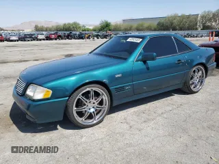 1994 Mercedes-Benz SL 5.0L with VIN WDBFA67E3RF103255, listed as a Copart auction lot 63043465 with 166,917 mi miles and Salvage title. Bid and sale history available at DreamBid. Image 1.