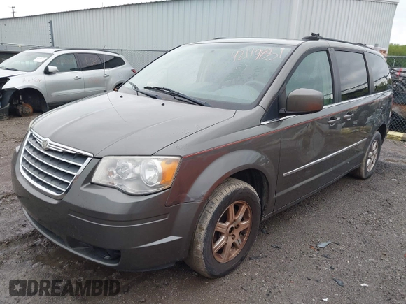 2010 Chrysler Town & Country Touring with VIN 2A4RR5D18AR386942, listed as a IAAI auction lot 42199851 with 143,924 mi miles and . Bid and sale history available at DreamBid. Image 2.