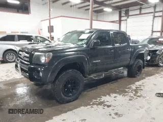 2009 Toyota Tacoma with VIN 3TMLU42N79M027885, listed as a IAAI auction lot 41146330 with 261,832 mi miles and . Bid and sale history available at DreamBid. Image 2.