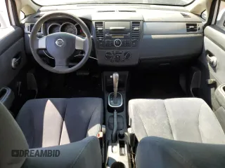 2009 Nissan Versa 1.8 S with VIN 3N1BC11E49L371066, listed as a Copart auction lot 57502474 with 157,127 mi miles and Salvage Title. Bid and sale history available at carsss.com. Image 8.