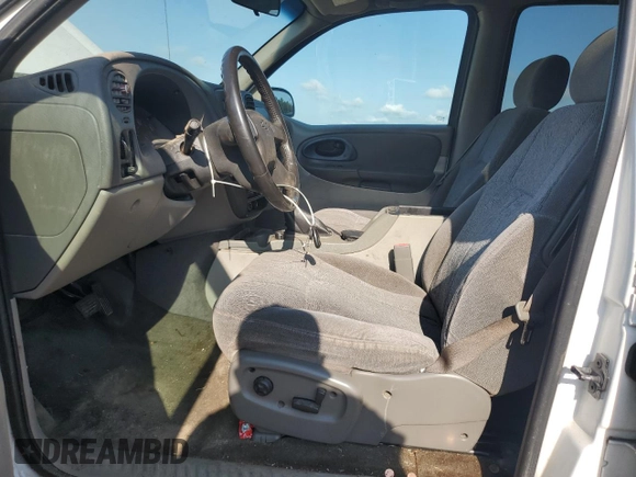 2003 Chevrolet TrailBlazer EXT LT with VIN 1GNES16S936156061, listed as a Copart auction lot 59590264 with 210,543 mi miles and Salvage Title. Bid and sale history available at DreamBid. Image 7.
