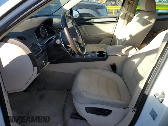 2012 Volkswagen Touareg Exec with VIN WVGEF9BP7CD009869, listed as a Copart auction lot 88099145 with Not Provided miles and Salvage Title. Bid and sale history available at DreamBid. Image 7.