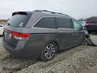 2015 Honda Odyssey Touring Elite with VIN 5FNRL5H91FB090767, listed as a Copart auction lot 51311705 with 174,818 mi miles and Salvage Title. Bid and sale history available at carsss.com. Image 3.