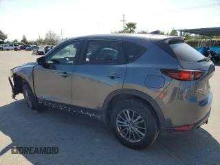 2017 Mazda CX-5 Touring with VIN JM3KFACLXH0131443, listed as a Copart auction lot 48524845 with 102,731 mi miles and Salvage Title. Bid and sale history available at carsss.com. Image 2.